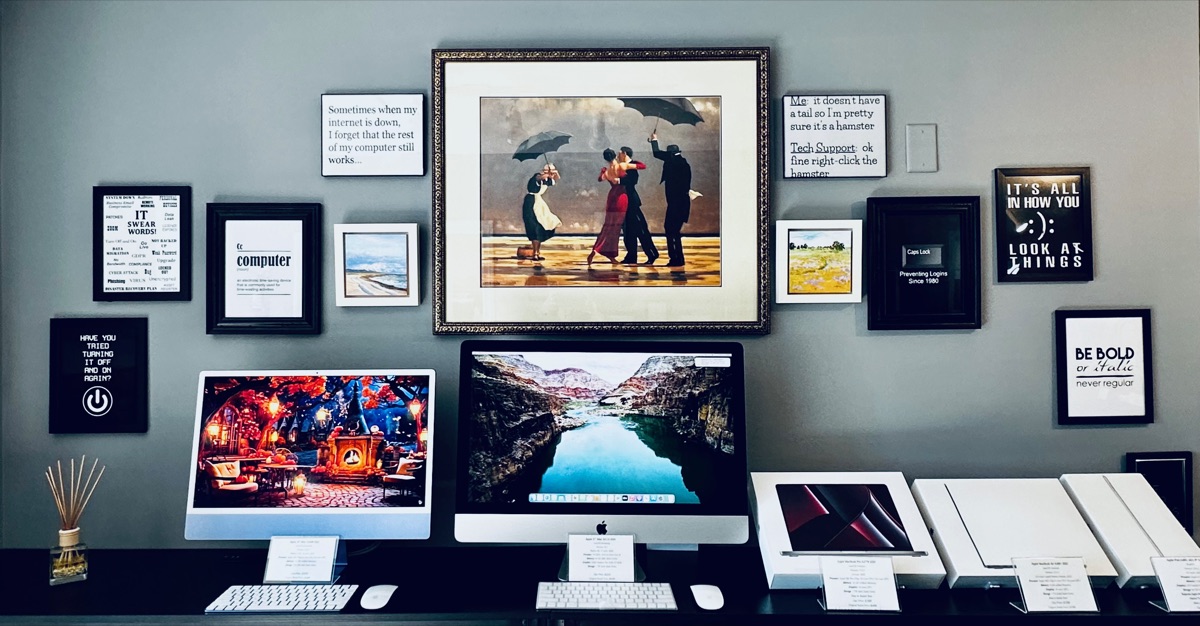 PC Solutions Cape Cod office showroom with iMac and MacBook computers on display in Yarmouth Port